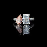 Emerald and pink pear engagement ring