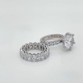 6ct Diamond Solitare With Oval Etarnity Band