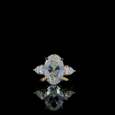 Oval With Pear Pointer Diamond Ring