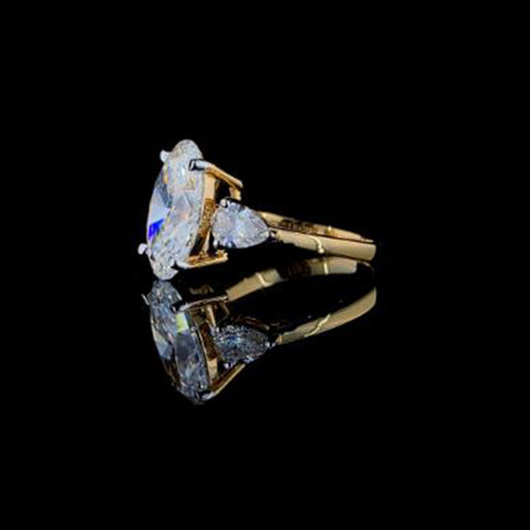 Oval With Pear Pointer Diamond Ring