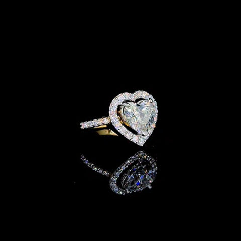 Heart touching solitaire diamond engagement ring