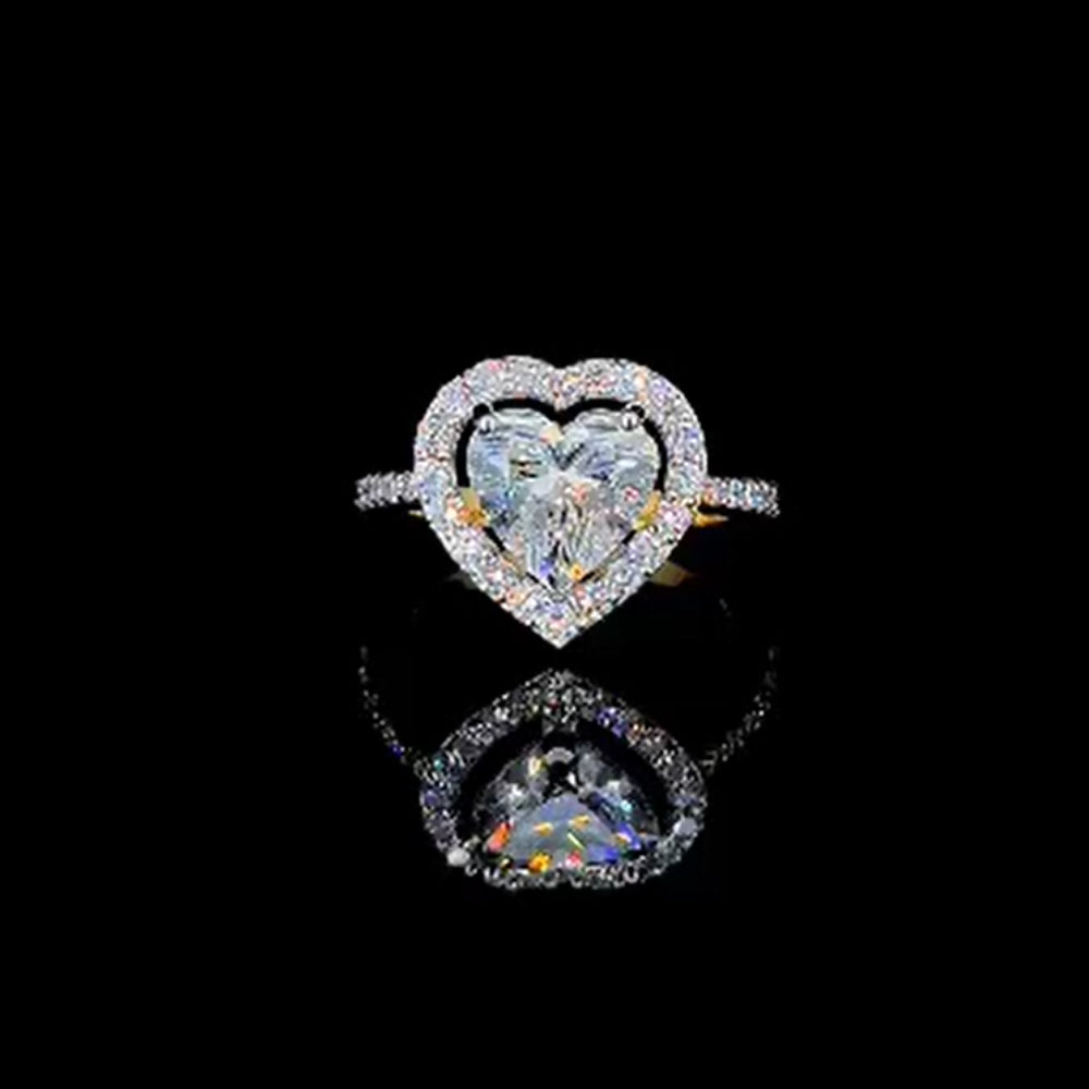 Heart touching solitaire diamond engagement ring