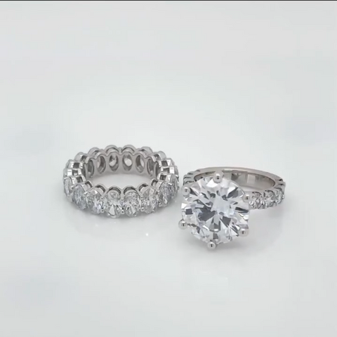 6ct Diamond Solitare With Oval Etarnity Band