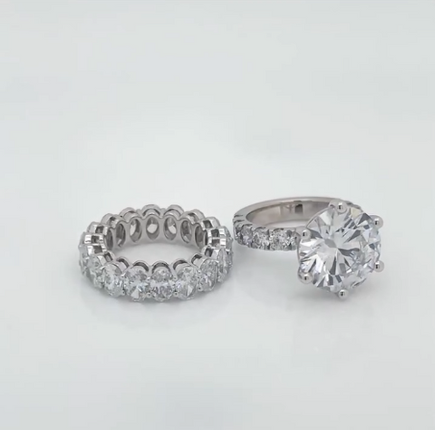 6ct Diamond Solitare With Oval Etarnity Band