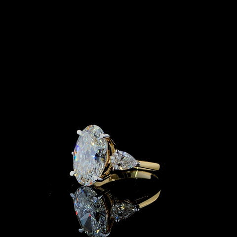 Oval With Pear Pointer Diamond Ring