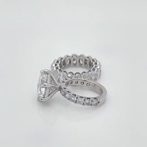 6ct Diamond Solitare With Oval Etarnity Band